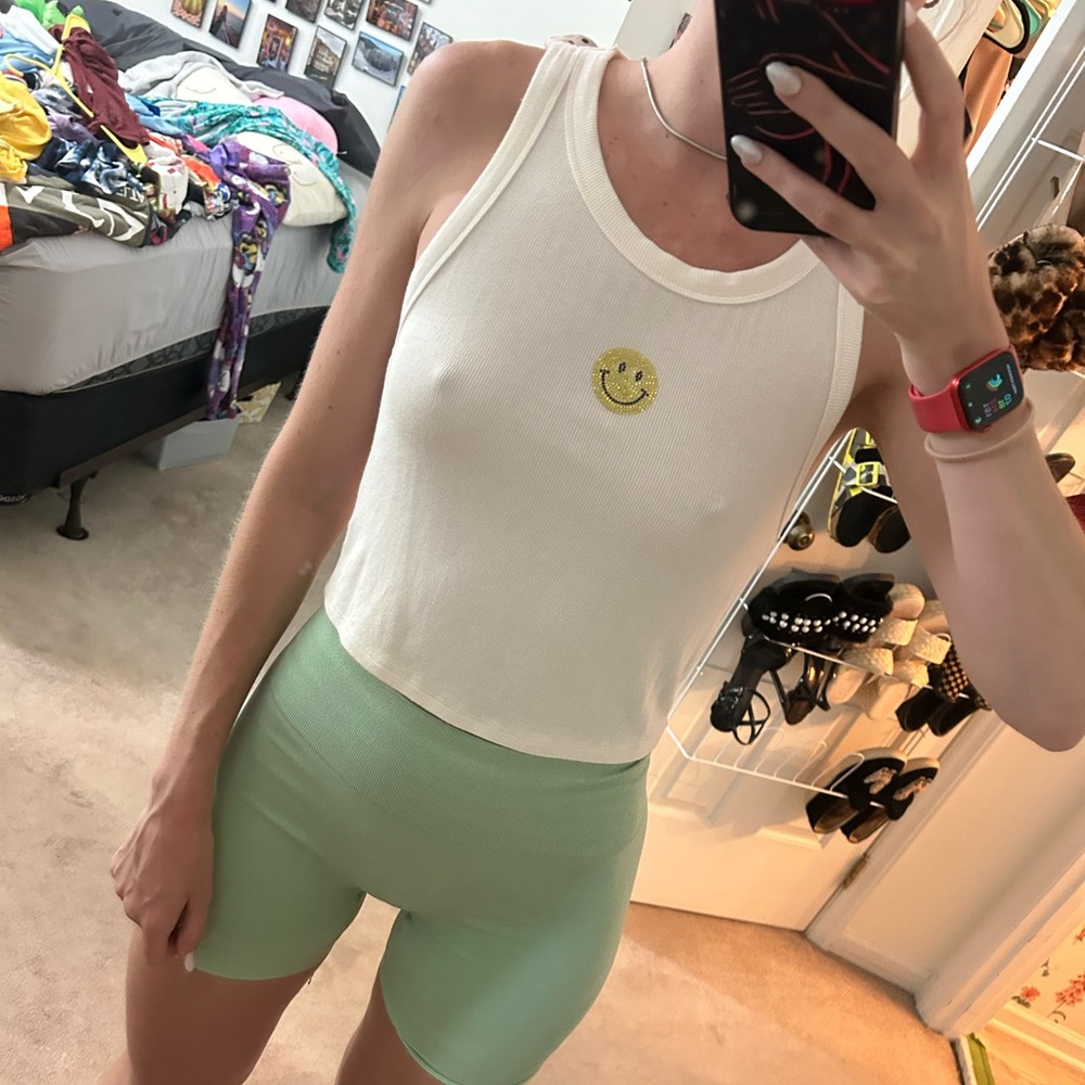 White smiley face crop top